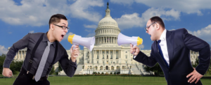 2 men w bullhorns shouting in front of US capital-congress