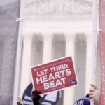 Pro-Life Protester Sign - Let their hearts beat