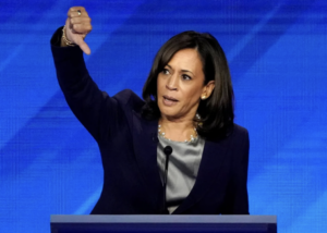 Then-senator Kamala Harris gestures at debatae