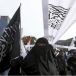 Muslim - Anti-Israel protesters - woman in burkah