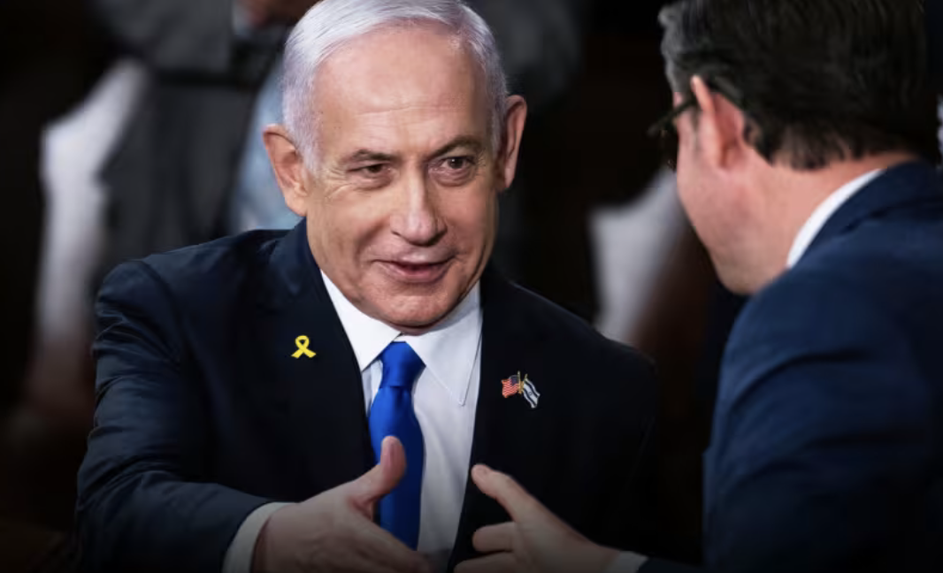 Prime Minister Netanyahu shakes Mike Johnson's hand after his speech to congress