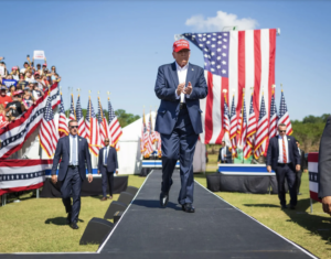 Trump walks to platform for campaign speech