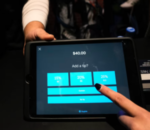 digital screen with suggested tip amounts