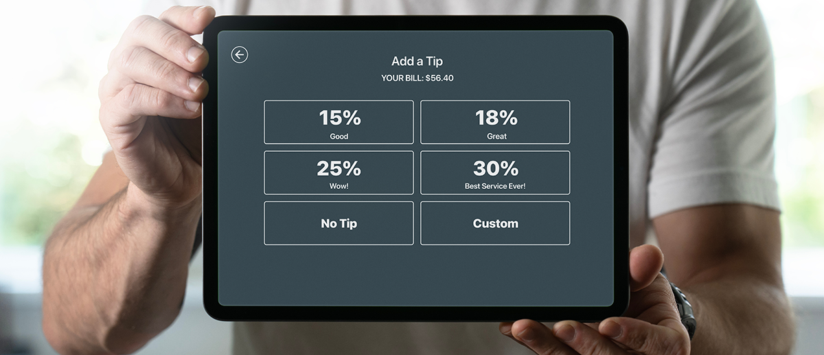 digital screen with suggested tipping amounts.png