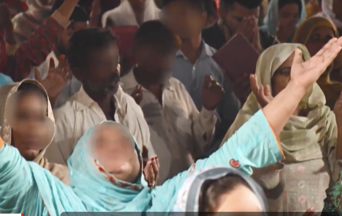 Iranians worshiping God - faces blurred