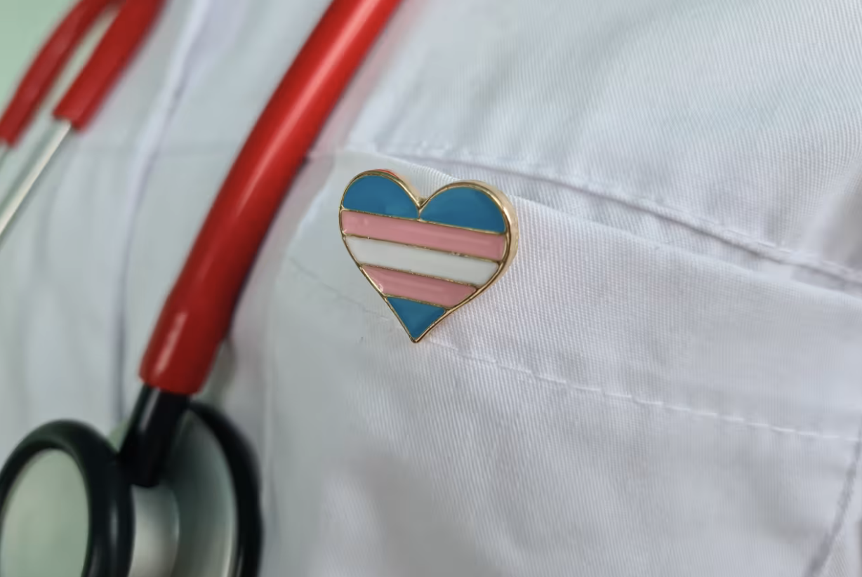 med-student with transgender heart pin