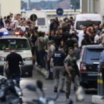 Emergency Vehicles and crowds after Pagers detonate in Gaza