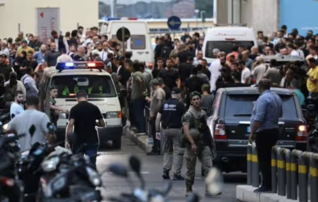 Emergency Vehicles and crowds after Pagers detonate in Gaza