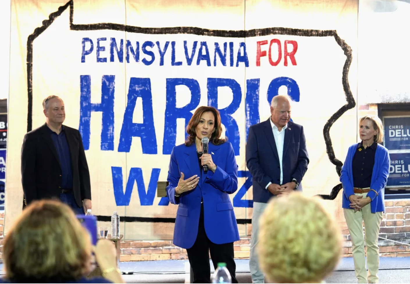 Harris and Walz and their spouses campaign