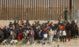 Migrants meet border patrol at US Border wall near El Paso, trying to enter the US