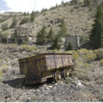 Abandoned Mine shaft and rusty mine car