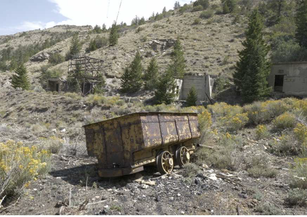 Abandoned Mine shaft and rusty mine car