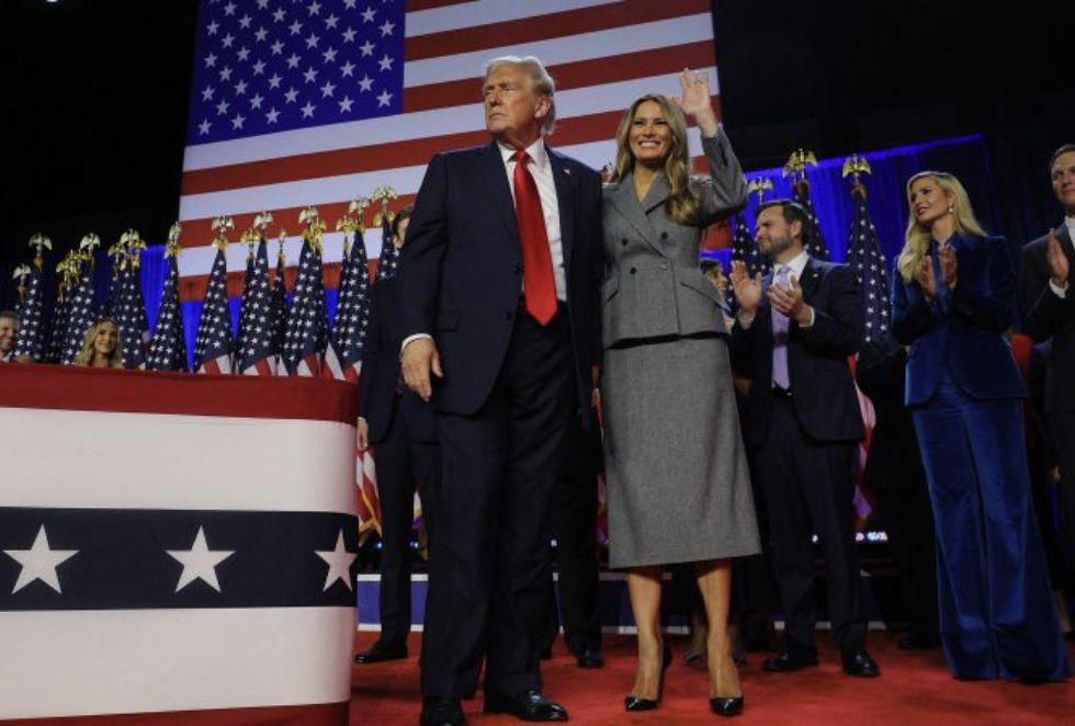 Donald and Melania Trump on post election stage