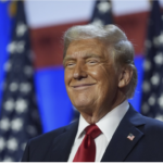 Trump smiles on stage Election Night