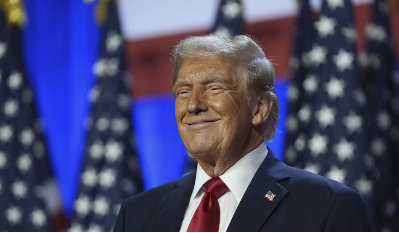 Trump smiles on stage Election Night