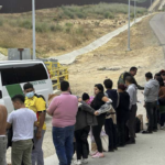 line of illegal immigrants caught by border patrol