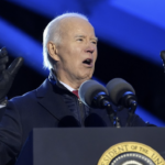 Aged Biden speaks outside in the cold