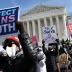 Pro and Anti trans protesters at Supreme Court building