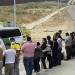 line of captured illegal immigrants and DPS