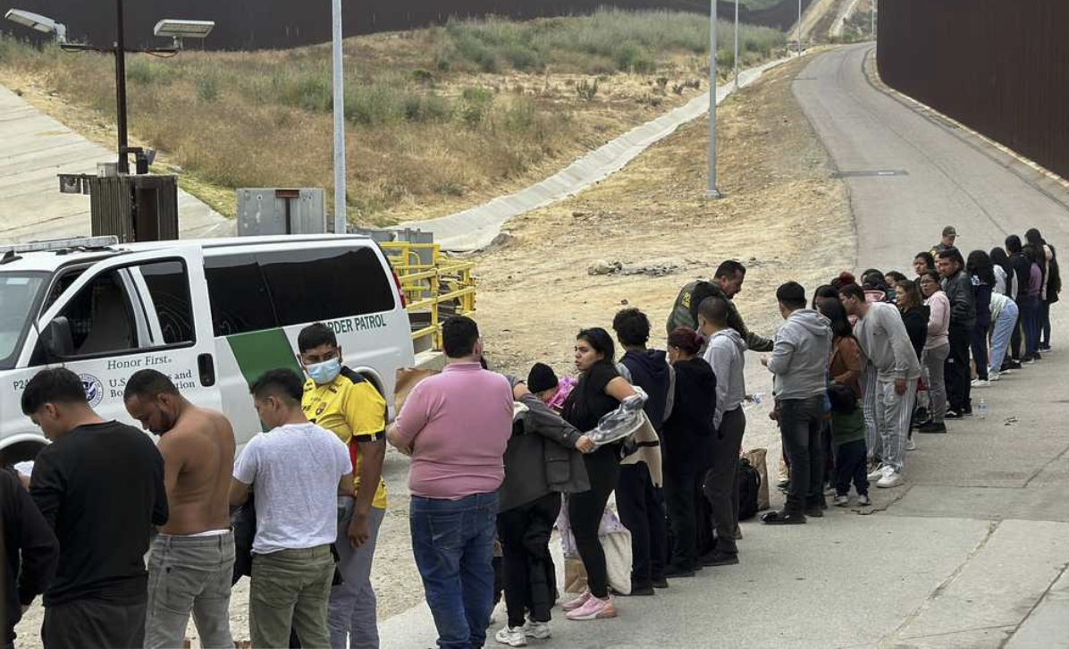 line of captured illegal immigrants and DPS