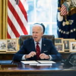 President Bush at the Resolute Desk in the Oval Office