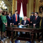 Republican leaders around Trump signs Executive Orders