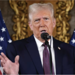 Trump speaks at a podium at Mar-a-lago