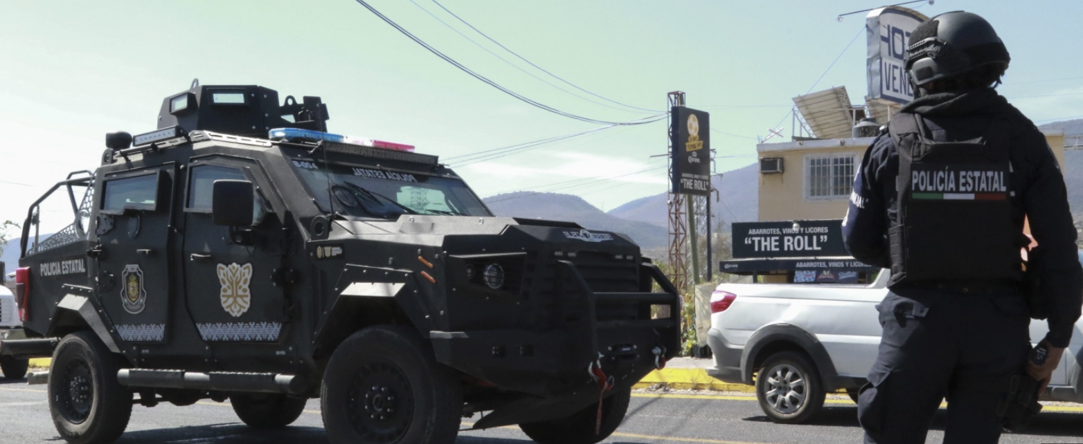 Mexico's Border Agent and armored vehicle