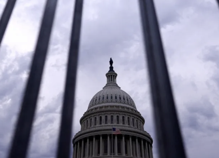 The Capitol building through bars