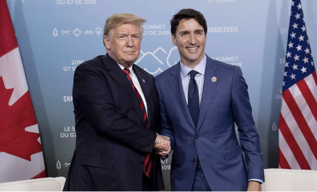 Trump shaking hands with Justin Trudeau