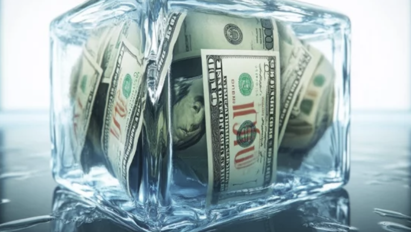 US Cash frozen in a block of ice