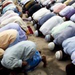 group of Muslims praying