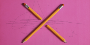 Pink Construction paper - X made of 2 pencils squiggles