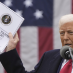Trump holding Foeign Trade Barriers book