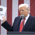 Trump holding Foreign Trade Barriers Book