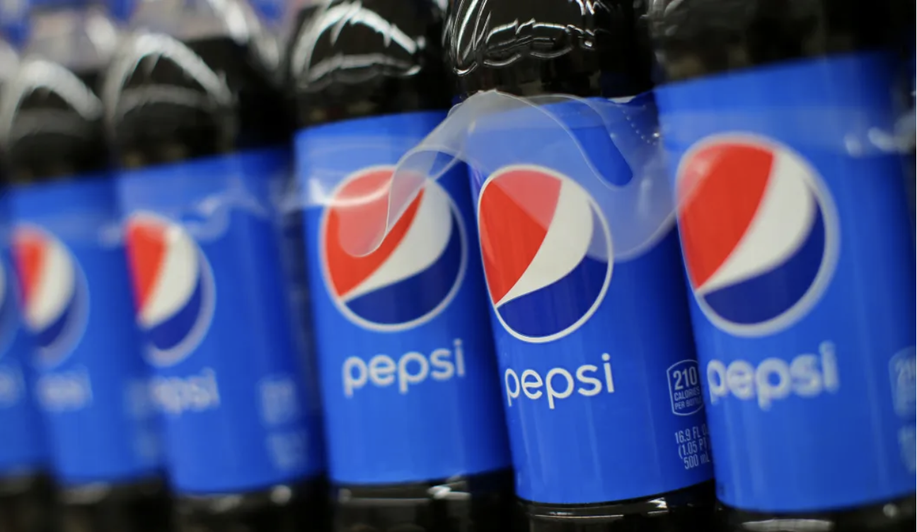 Bottles of Pepsi on grocery store shelves