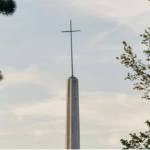 Church spire with cloudy sky