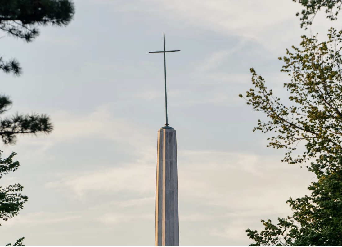 Church spire with cloudy sky