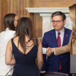House Speaker Mike Johnson shakes hands with victims of sexually explicit photos