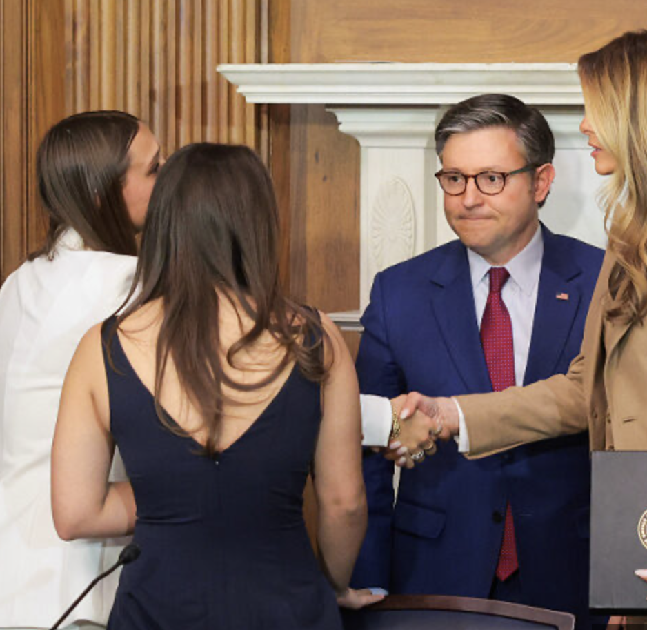 House Speaker Mike Johnson shakes hands with victims of sexually explicit photos