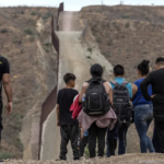 Migrants surrender to Immigration officials