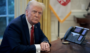 President Trump at his desk in the Oval Office