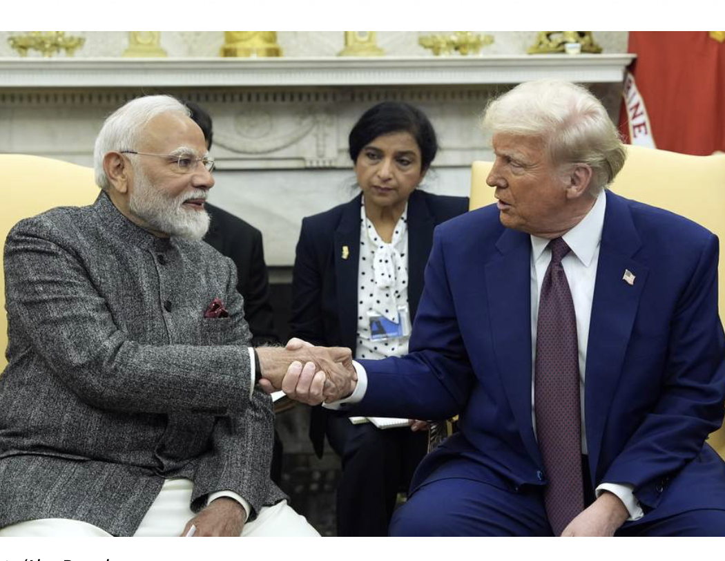 President Trump shakes hands with Indian PM Narendra Modi