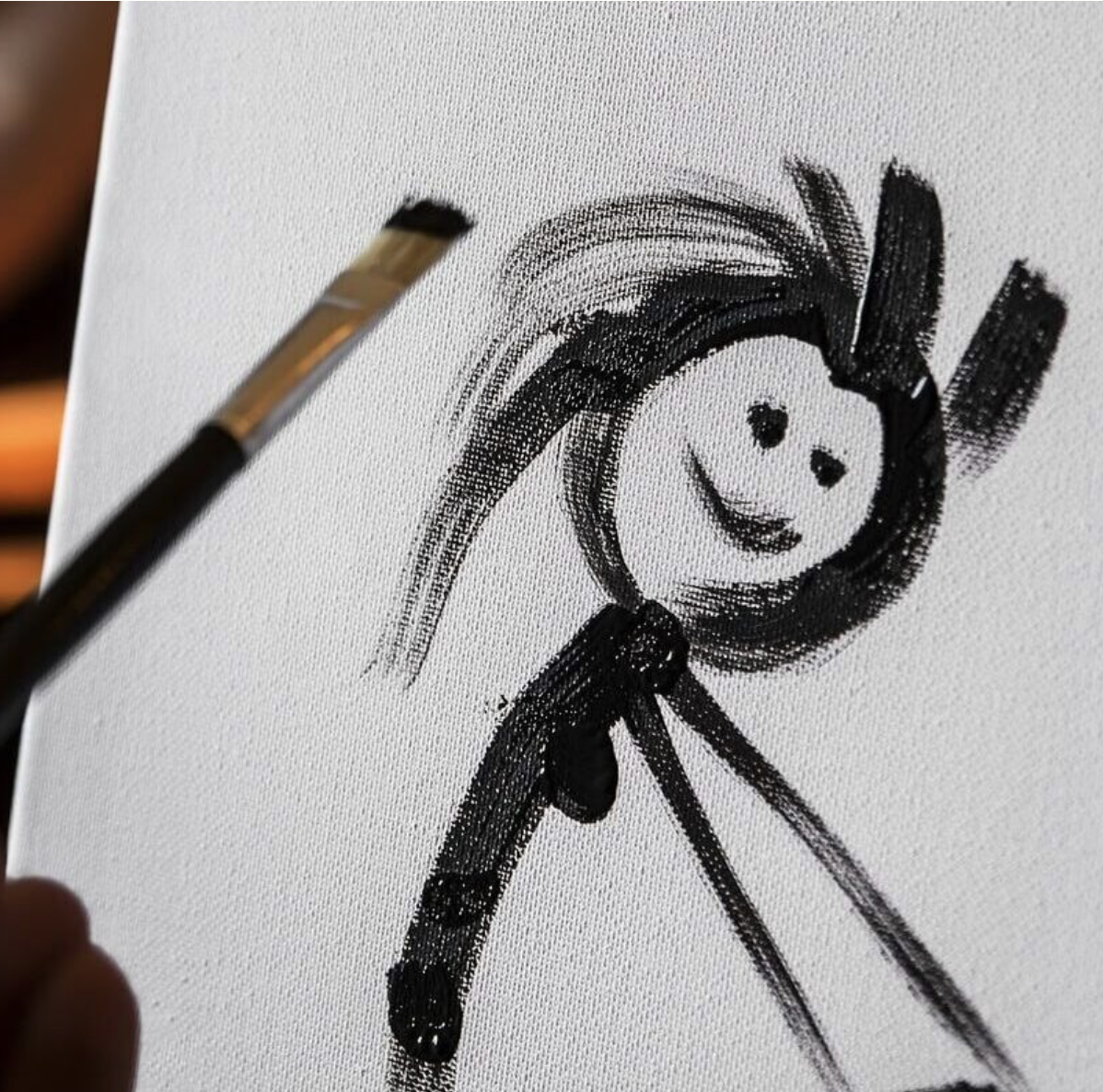 stick figure painting of a woman