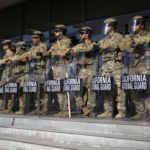 California National Guard standing against protesters