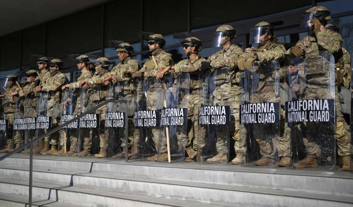 California National Guard standing against protesters