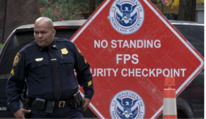 ederal security officer stands at a checkpoint outside the Jacob Javits Federal office building in New York City