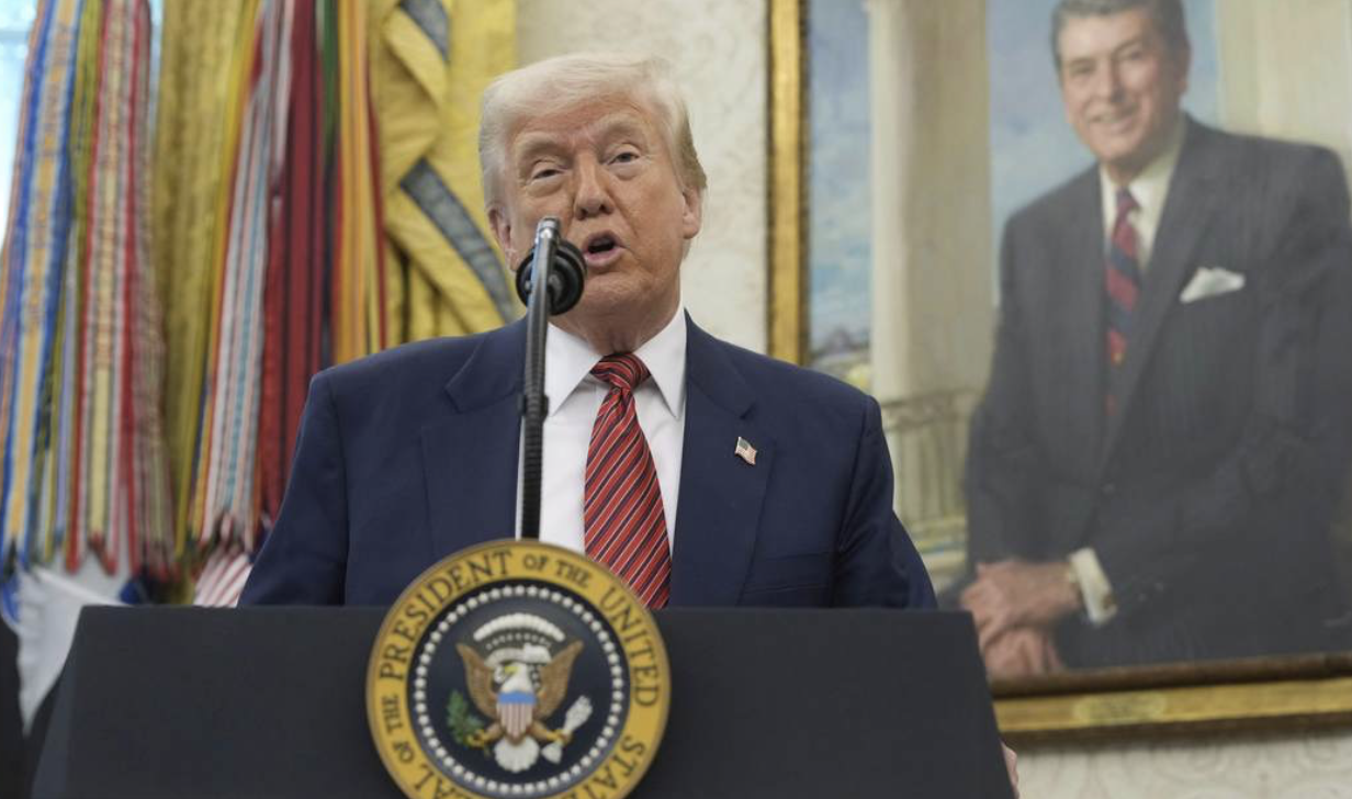 Trump Speaks in front of Reagan portrait