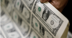 dollar bills being inspected at Bureau of Engraving Printing