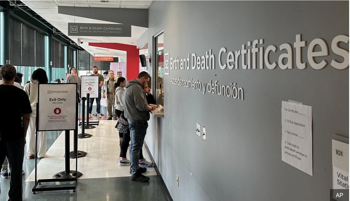 People in Line for Birth or Death Certificates